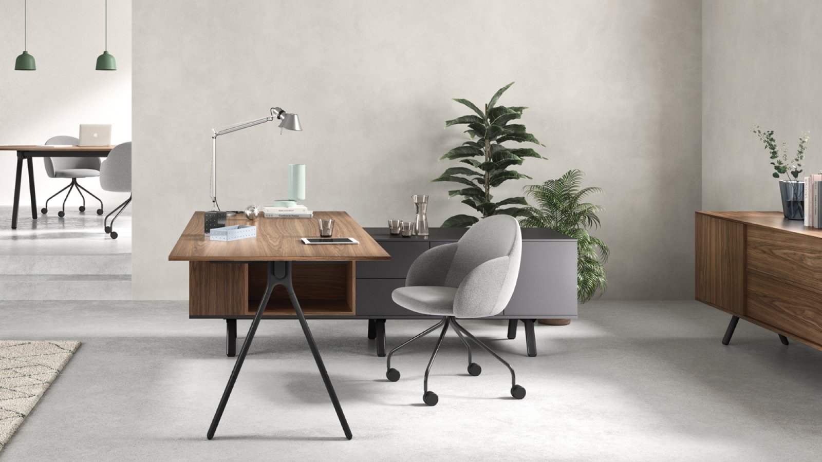 Designskrivbord Lay från Archiutti med ljusgrå skivor och röd stomme