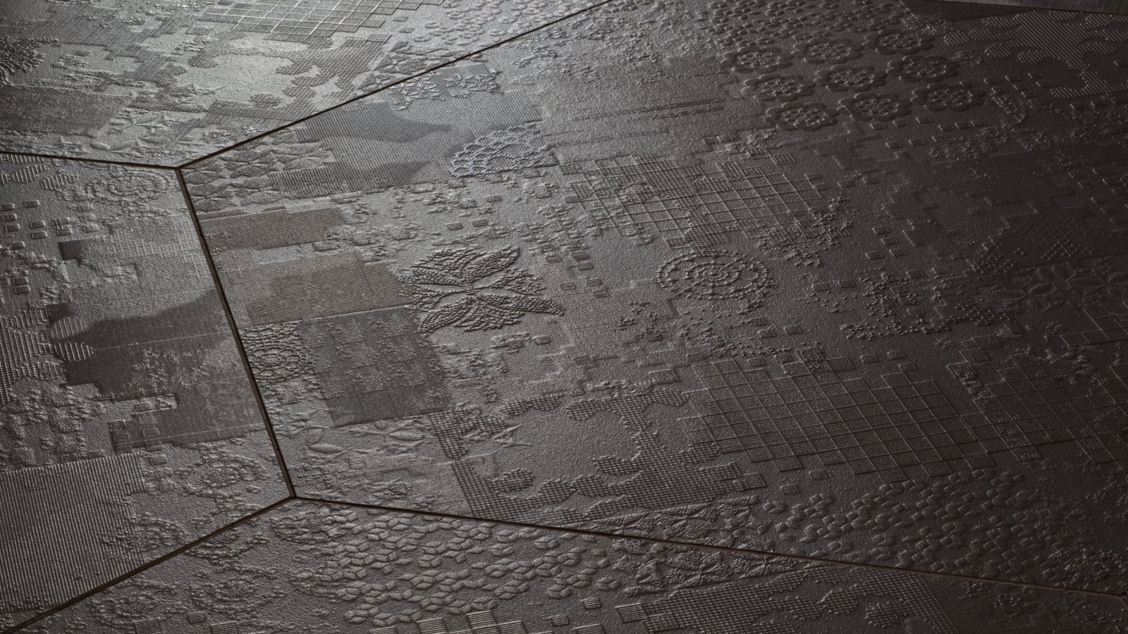 Déchirer porslinsgolv från Mutina med betongeffekt-relief