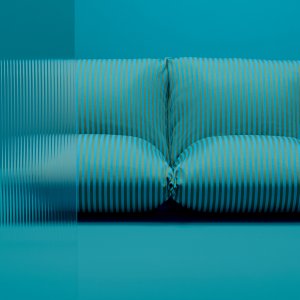 Designstol Brezza av Alessandro Stabile i en trädgård