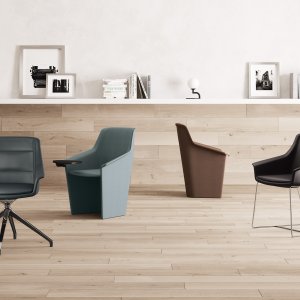 Detalj av den hantverksmässiga ton-i-ton-kviltningen på Jera Chair