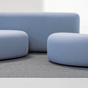Den lilla sittpuffen Lisse ensam, oregelbundet oval sedd uppifrån