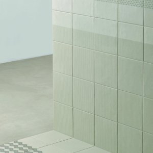 Moenster Grainy Black fraan Tape Mutina paa svart bas