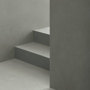 Primavera Nero golv med Grigio vägg och skinnfåtölj